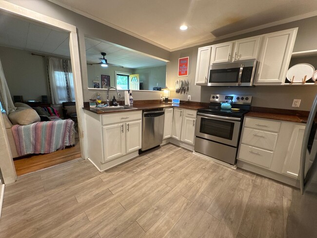 Building Photo - Charming 1940s Cottage in the Heart of Mad...