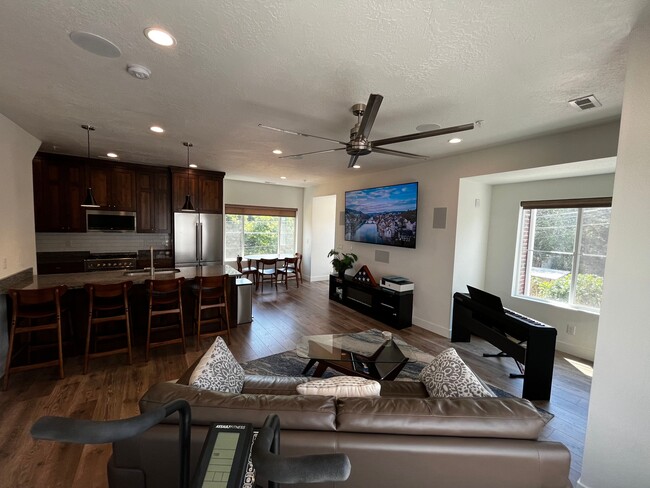 72" nickel finish ceiling fan. Large windows let the sun shine in. - 361 W Reed Ave