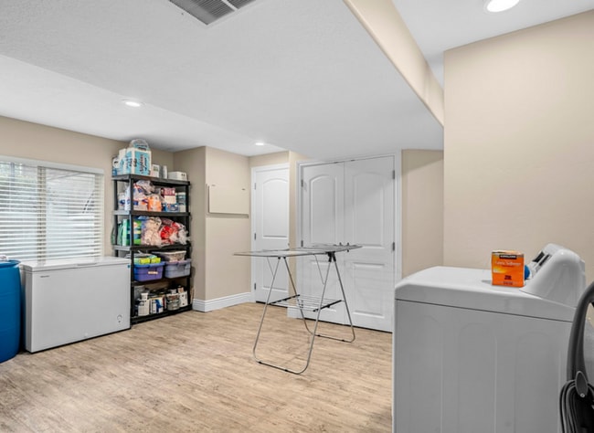 Building Photo - Spacious 5-Bedroom Home with Theater Room & Prime Location