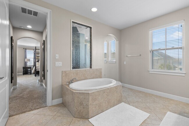 Building Photo - Luxury Waterfront Pool Home in Laureate Park | 4BR + Water Views