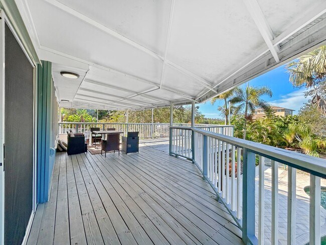 Building Photo - 4 Bed Waterfront Paradise with Pool, Dock & Gulf Access in Baileys Bluff