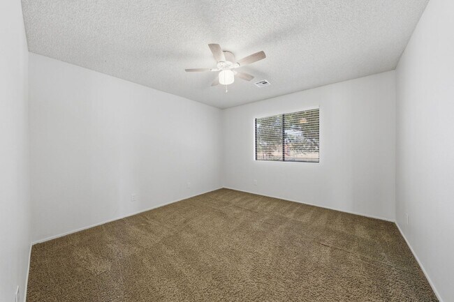 Building Photo - Green Valley Beauty with Solar, New A/C & Spacious Corner Lot