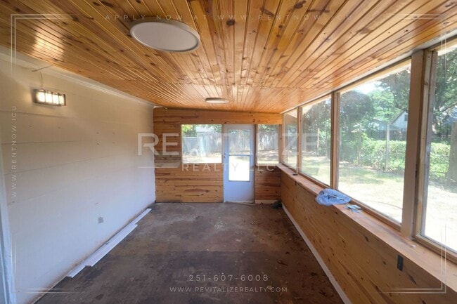 Building Photo - Brick Home with Carport