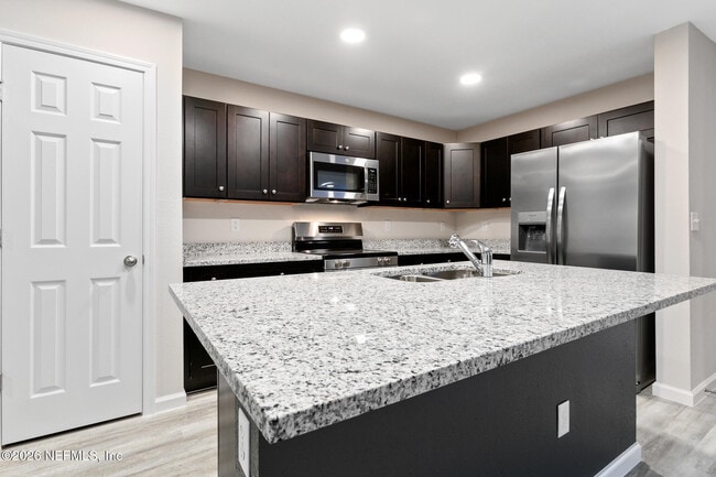 Building Photo - 8822 Eaton Ave