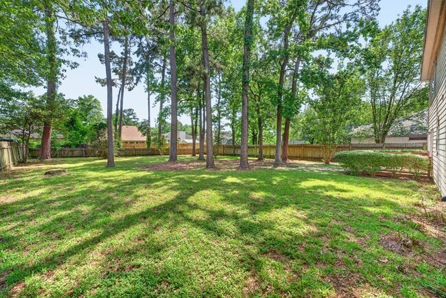 Building Photo - 6535 Woodland Oaks