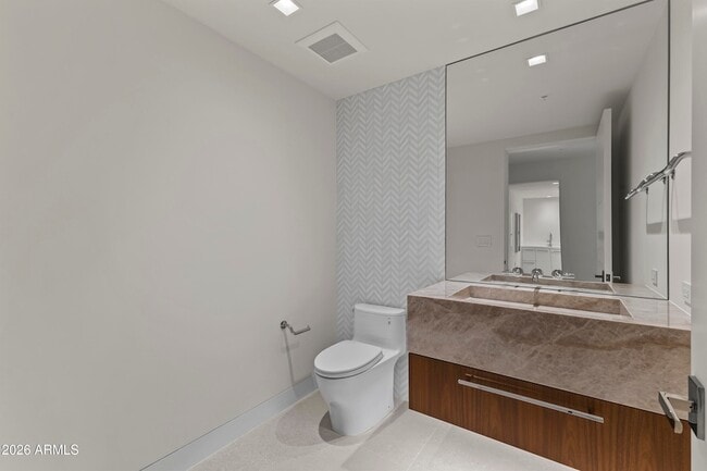 Building Photo - 6587 N Palmeraie Blvd