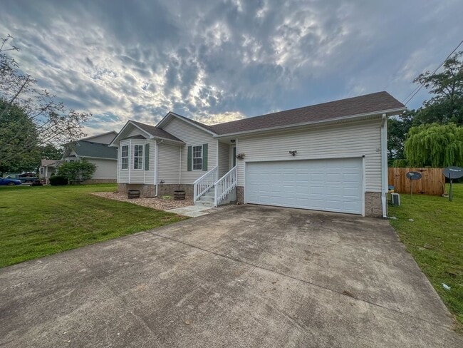 Building Photo - Massive Fenced Backyard with a Shed and Ga...