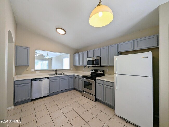 Building Photo - 7059 W Gardenia Ave