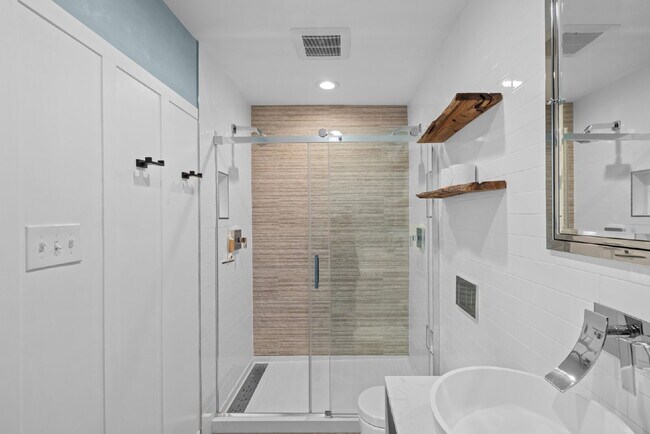 Building Photo - Completely Renovated Corner Townhome with Modern Kitchen, Designer Baths, and Private Yard