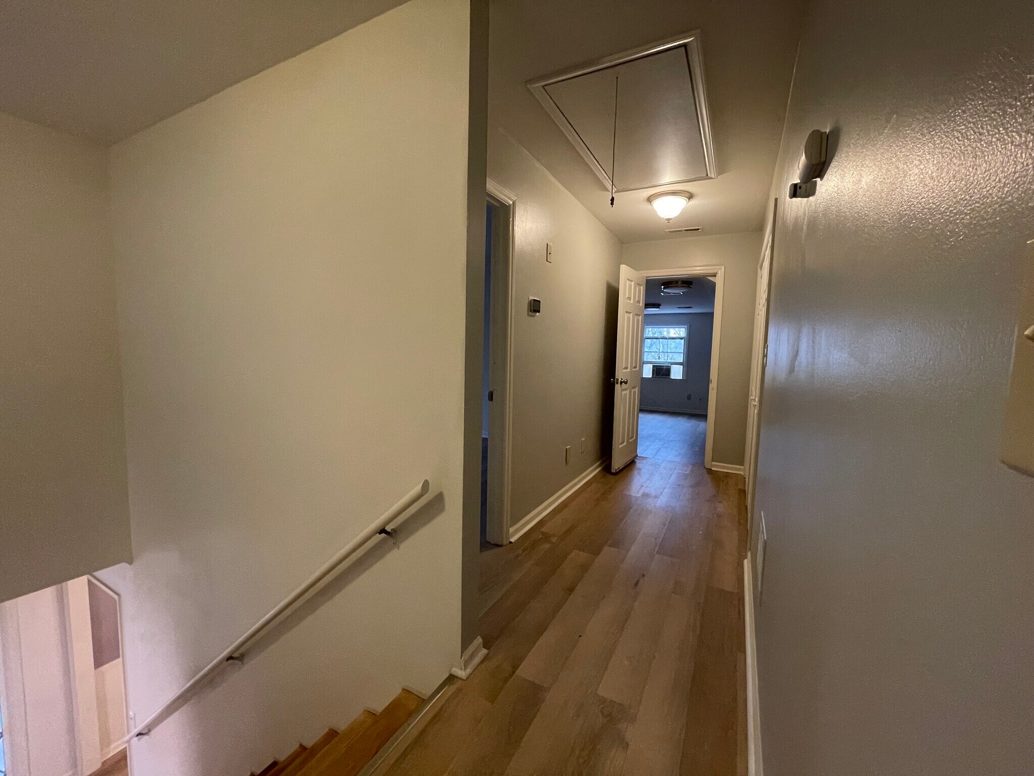 Upstairs hallway with laundry on the right - 3 Tyrol Ct