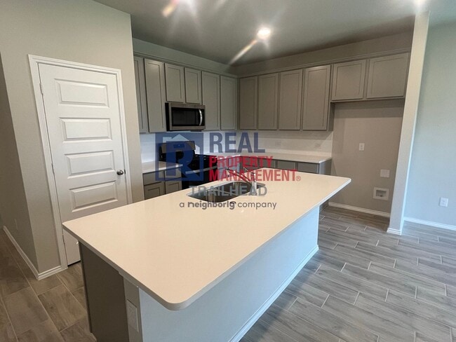 Building Photo - Striking 3 Bedroom/3 Bath Open Concept Hom...