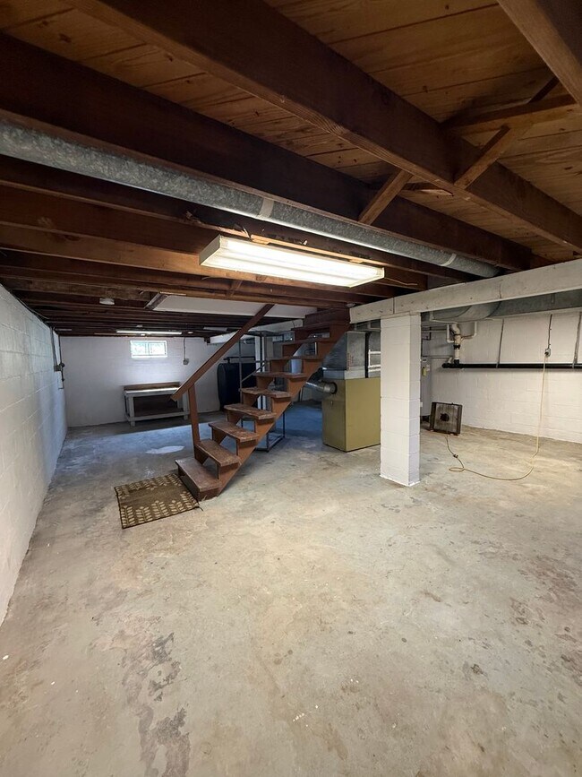 Building Photo - Charming 4-Bedroom Cape Cod Home with Spacious Yard & Storage
