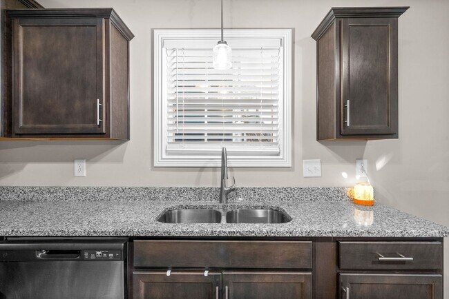 Building Photo - Stocked Pond, Walking Trails and More!!