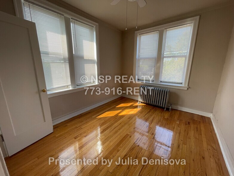 Building Photo - 1373 W Estes Ave