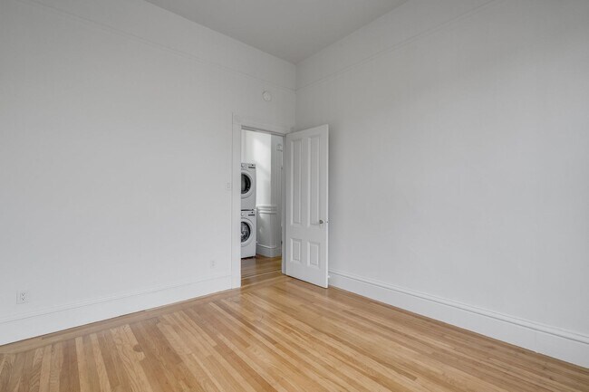 Building Photo - Remodeled pet friendly, top floor 2BR with in-unit laundry