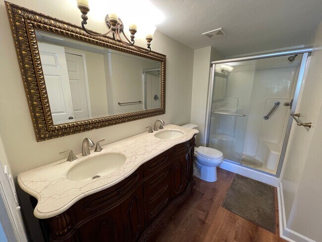 Building Photo - ANNUAL RENTAL - 3 BED / 2 BATH WITH CARPOR...