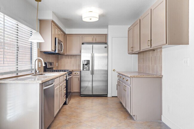 Building Photo - Spacious 3-Bed, 1.5-Bath Townhome with Oversized Private Patio in Central 89103 — Bright Bedrooms...