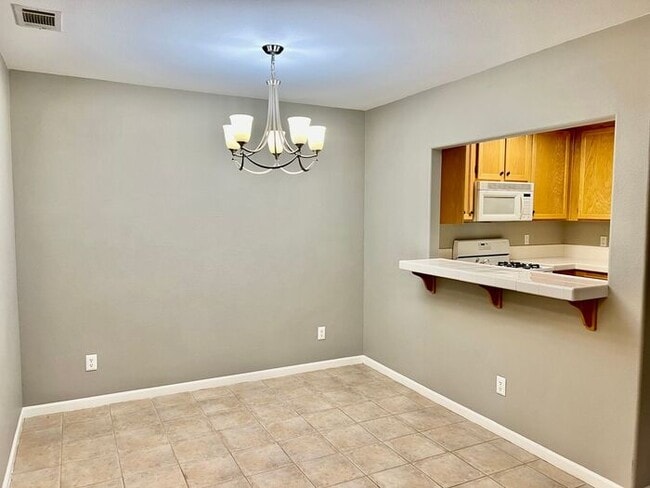 Building Photo - Welcome to this beautiful 3-bedroom, 2-bathroom condo in the desirable Avalon at Eagles Crossing