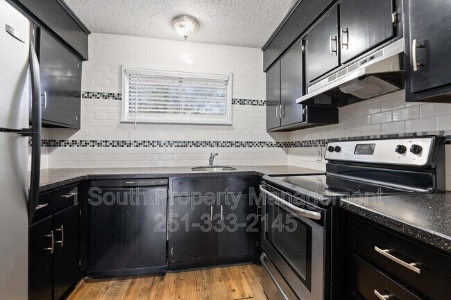 Building Photo - 6527 Old Shell Rd