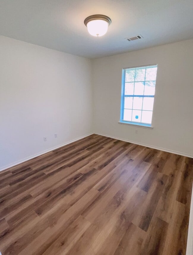 Building Photo - Fenced yard/Storage building/Close to college/Paved street