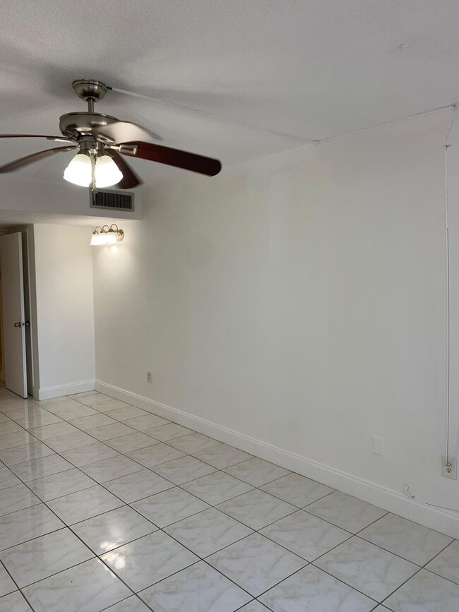 Building Photo - For Rent: Spacious One-Bedroom with Den in...