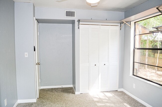 Building Photo - Check out this huge private fenced back yard at this Timberlane home!