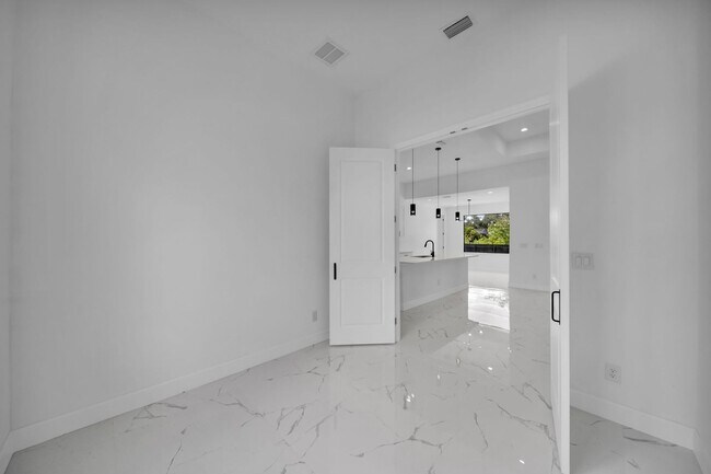 Building Photo - Brand-New Pool Home for Rent – Port Charlo...