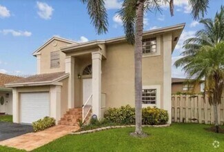 Building Photo - 3700 NW 107th Terrace