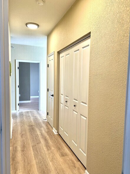 Hallway leading to master bedroom. - 8412 S Holland Ct