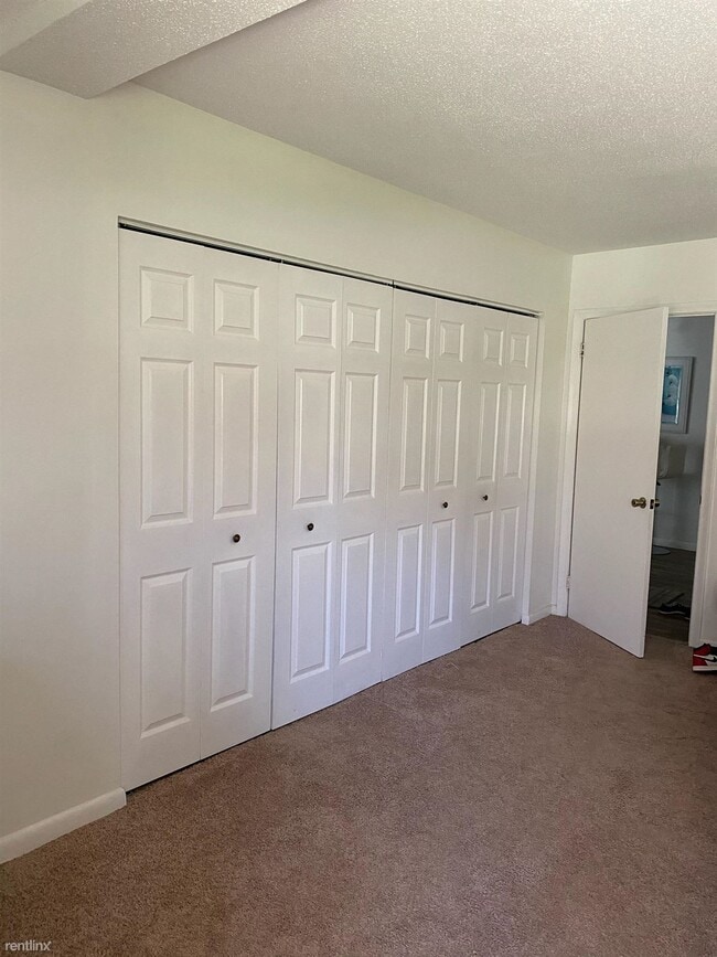 Building Photo - 1 br, 1 bath Condo - Pine Ridge Condominiums