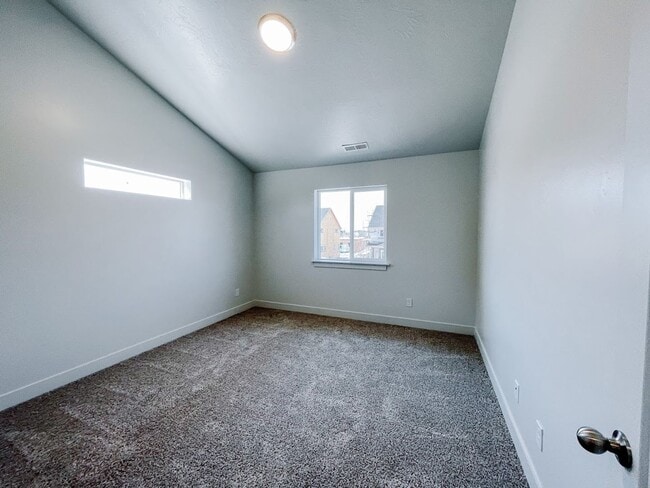 Building Photo - Brand New Idyllic Townhome in AF