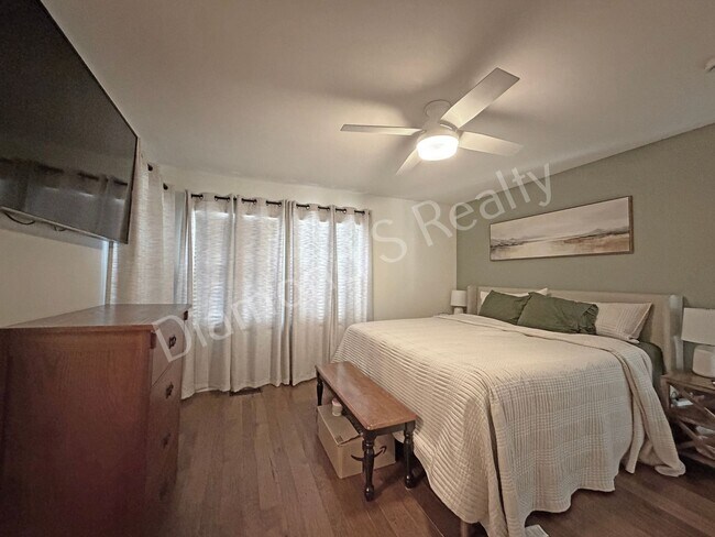 Building Photo - Stunning 3_Bed Home with Two Primary Suites & a Pool!