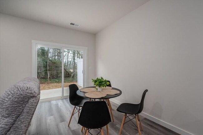 Building Photo - Brand-New Luxury Townhomes – First Month's...