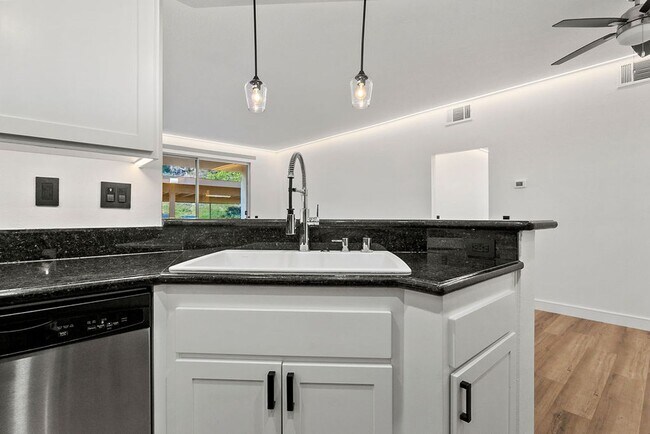 Building Photo - Stunning Single-Level 2-Bedroom Condo with Designer Upgrades Throughout!