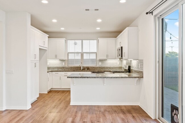 Building Photo - Beautiful newly built 4 bedroom, 3 bath home in the quiet, gated community of Westgate!