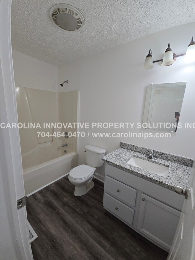 Building Photo - 1409 Tinnin Ave