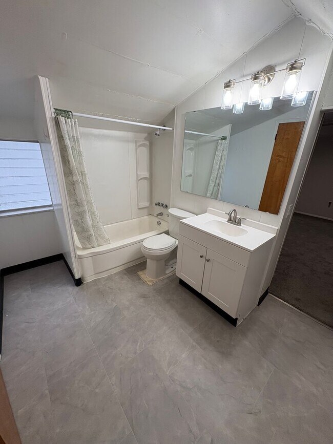 Building Photo - NORWOOD- Cute 2 bedroom 1.5 baths with fenced yard