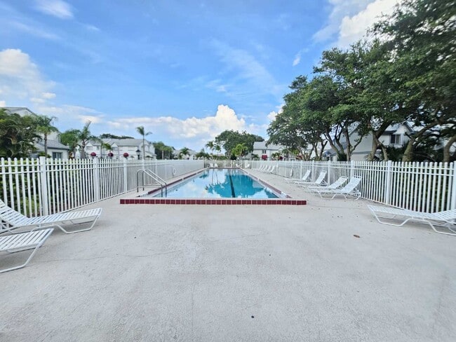 Building Photo - Available Feb. 1st, 2026! Charming Cape Canaveral Townhouse: 2 Bed, 2.5 Bath Retreat with 1,120 S...