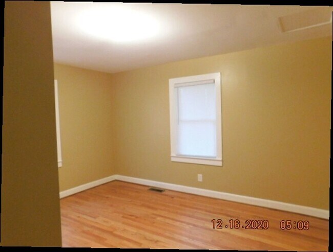 Building Photo - Home with 2 bedrooms, 1 bath, side deck, carport with side porch and detached garage