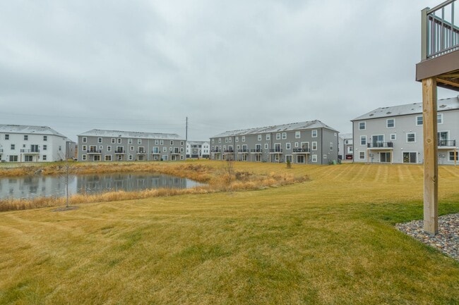 Building Photo - Awesome maple grove 5 bed 4 bath townhome! Pond views, 2 years old!