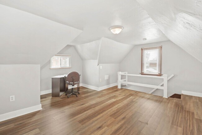 Building Photo - JUST LOWERED! EXPERIENCE THE ULTIMATE SAVI...