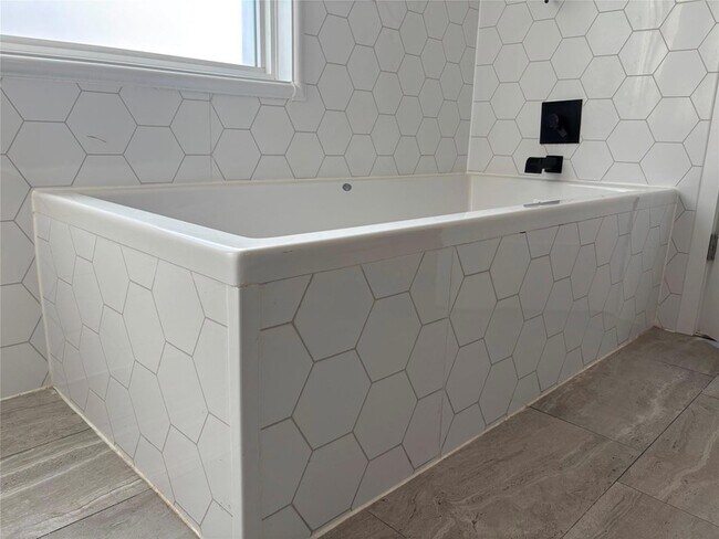 Building Photo - 7525 Windrush Dr