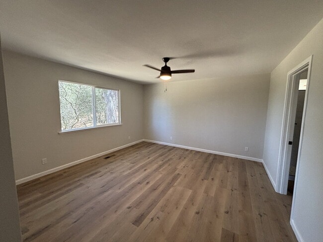 Building Photo - Fully remodeled home nestled on a spacious...