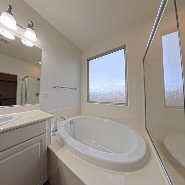 Building Photo - Exceptional Dual Master Residence with Modern Upgrades