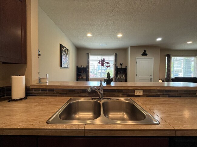 Building Photo - Stunning 4 Bedroom + Loft Bethany Home with Open Layout, Stainless Steel Kitchen, Two Car Garage ...