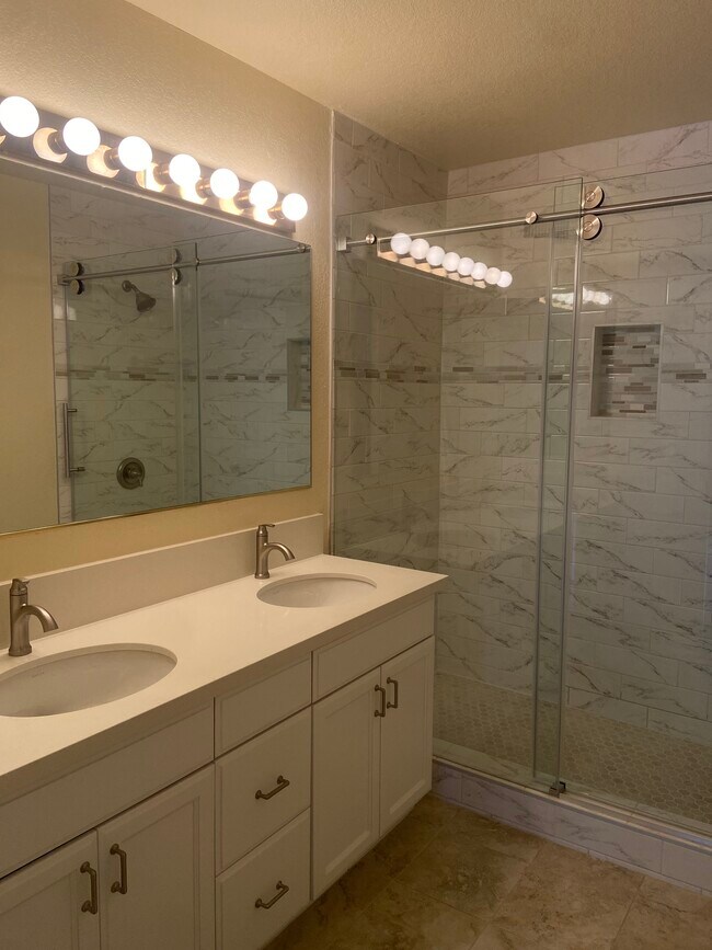 Large, newly renovated master bathroom. - 435 E Valencia Ave