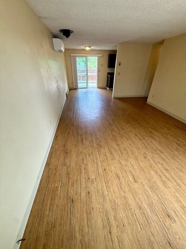 Building Photo - Charming 2-Bedroom, 1-Bath Duplex with Garage & Fenced Backyard