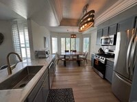 Building Photo - 600 The Strand N