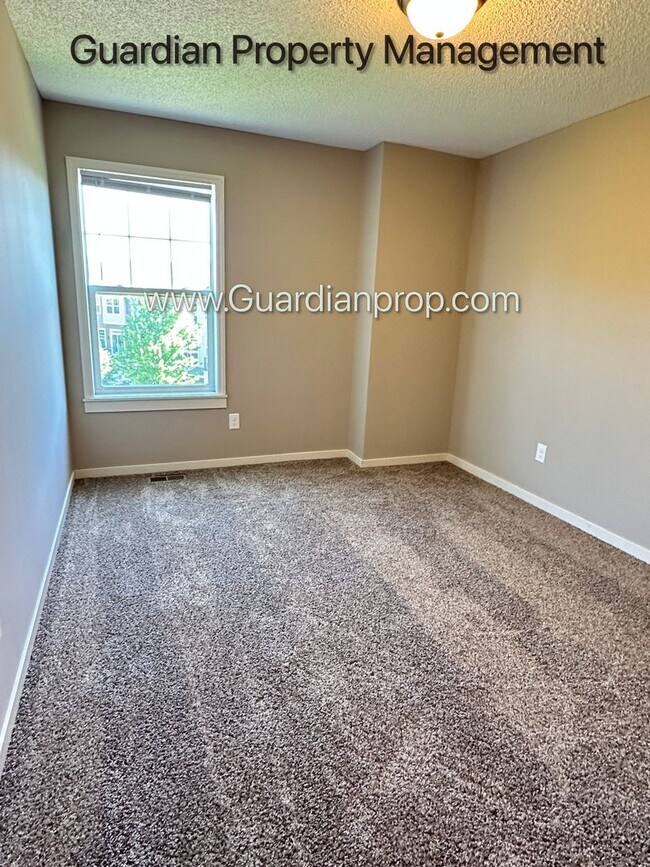 Building Photo - Champlin Corner Unit Town Home, 2 Car Garage, Dishwasher, Washer/Dryer, Balcony