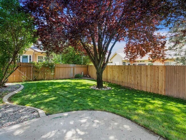 Building Photo - June Rent Free!!  Move Today!  Four Bedroom, Three Bath Home with Beautiful Backyard, Two Car Gar...